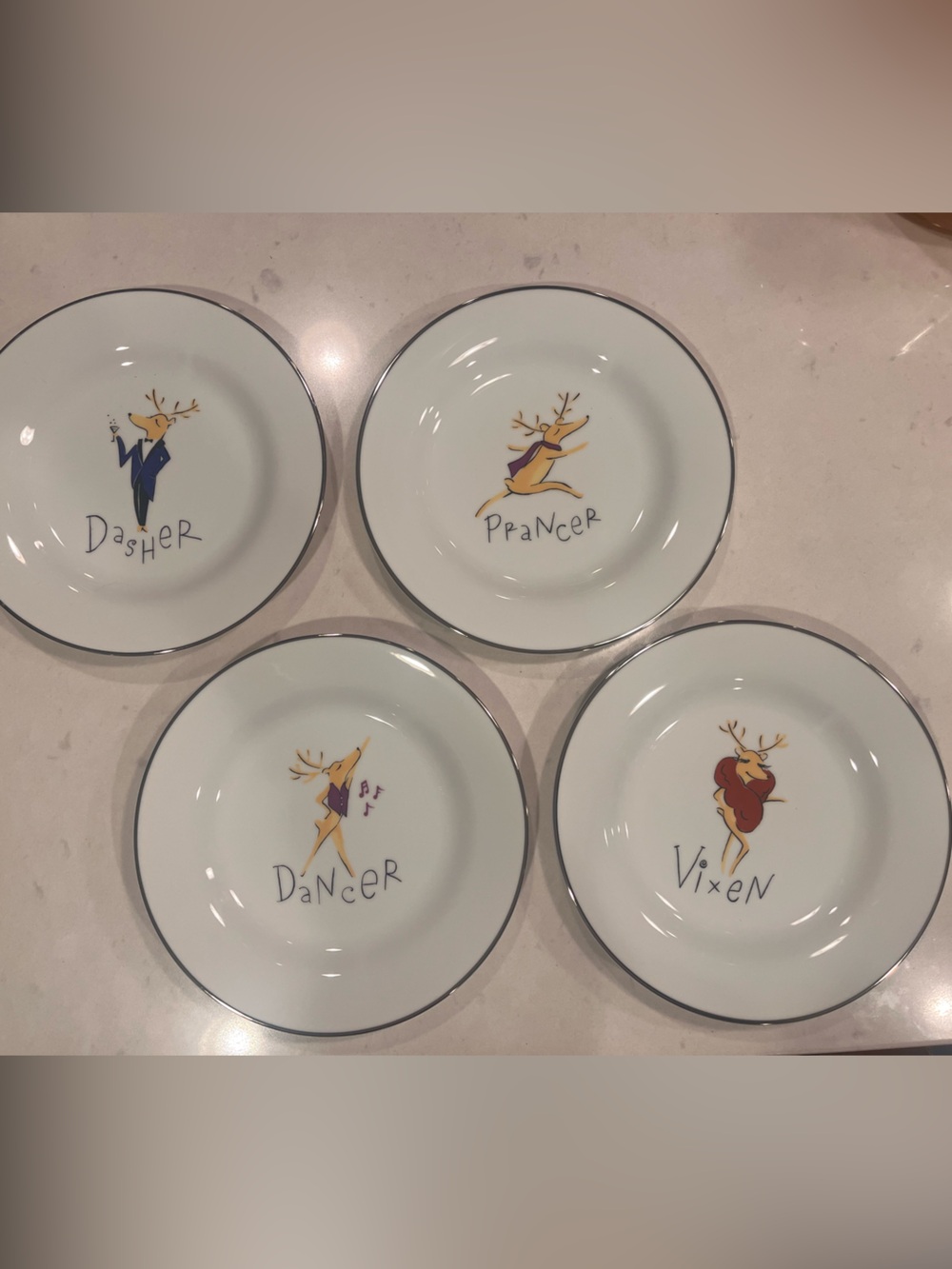 Pottery Barn White Dessert Plates with Santa’s Reindeer and Silver Rim